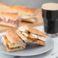 Fig and Brie Baguette · Creamy brie with fig jam on baguette.