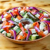 27- GREEK SALAD · Roman lettuce, grape leaves, feta cheese, cucumber, red onion, red pepper, plum tomato, Gree...