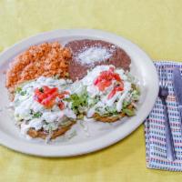 Combo #4 One Tostada and One Sope and flauta · Fried tortilla topped with beans your choice of meat, lettuce, tomato, cheese, and sour crea...