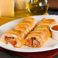 Pepperoni Roll · Rolled homemade Pizza Crust, Pepperoni, Mozzarella Cheese, homemade Pizza Sauce