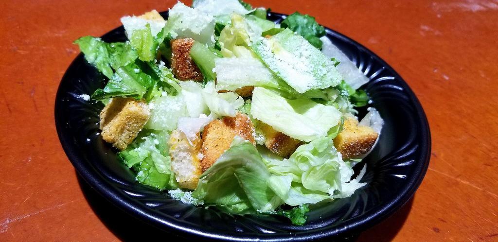 Caesar Salad · Fresh Cut Romaine Lettuce, Croutons, Grated Romano Cheese
(Choice of Dressing)