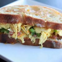 Western Omelette Sandwich · Ham and egg sandwich with pepper and onion..