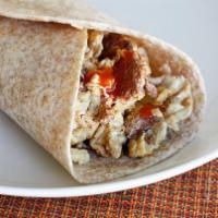 Western Omelette Wrap · An omelette served with scrambled eggs, ham, bell peppers and onions.
