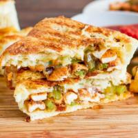 P8. Chicken Fajita Panini · Grilled chicken, cheddar cheese, roasted peppers, caramelized onions and salsa.