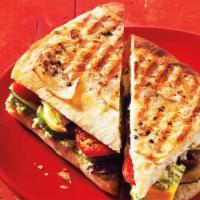 P17. Mediterranean Panini · Hummus and olives with roasted peppers grilled zucchini, eggplant and fresh mozzarella with ...