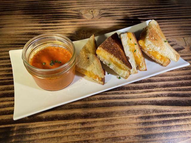 Mini Grilled Cheese  · 3 cheese blend, rosemary mayo with a side of tomato dipping sauce. 