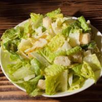 Caesar Salad  · Chopped romaine, herbed croutons, Parmesan cheese and Cesar dressing.