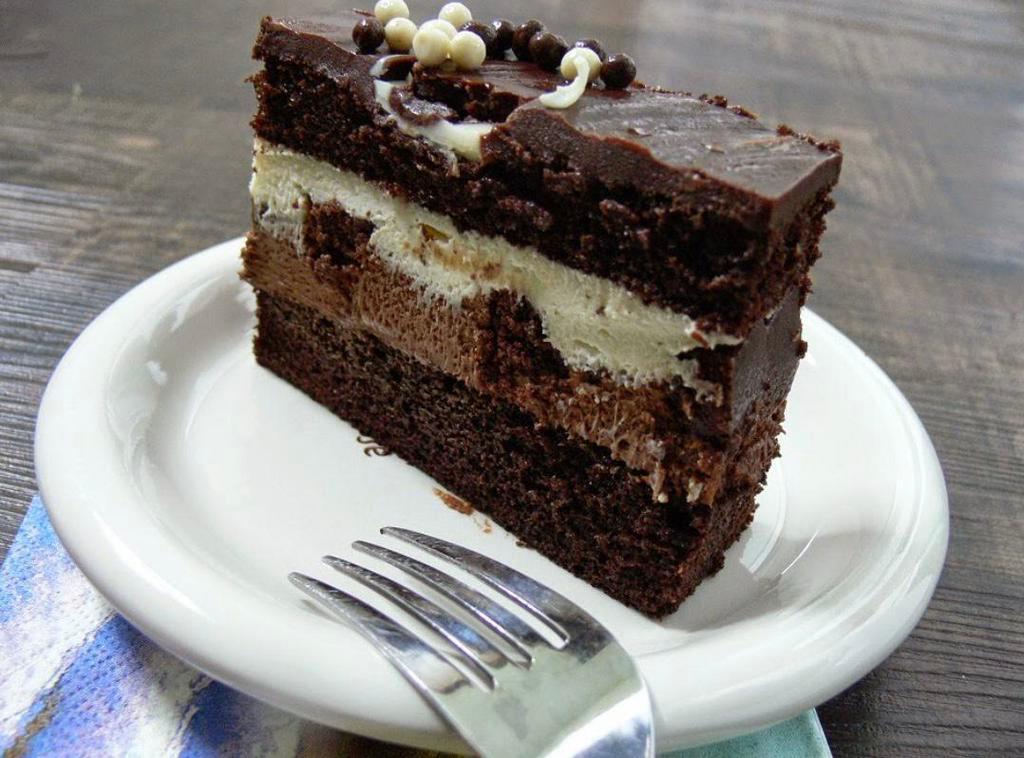 Tuxedo Chocolate Cake  · Moist chocolate cake filled with rich chocolate mousse and sweet white chocolate filling & brownie chunks. It’s a chocolate lover’s dream come true!