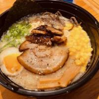Miso Ramen  · Miso soup combined with chicken and pork broth with 12 vegetables blend in miso, fermented f...