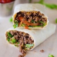 Premium Grilled Ground Beef Wrap · Premium grilled ground beef wraps with fresh lettuce, tomatoes, onion, chipotle peppers, gar...