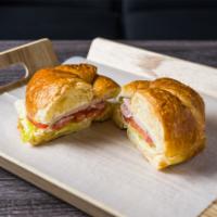 Ideal (ham and Egg) Croissant Sandwich · House special 2 hams with American cheese or Swiss cheese with lettuce, tomatoes, butter and...
