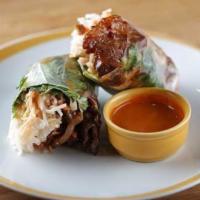 Marinated Grilled Pork Summer Rolls (2 Pieces) · House special marinated grilled pork wrapped with lettuce cucumber and rice noodle.