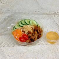 Marinated Grilled Chicken Bowl · Item contains: rice noodle, lettuce, tomatoe, cucumber, marinated carrot and white radish, g...