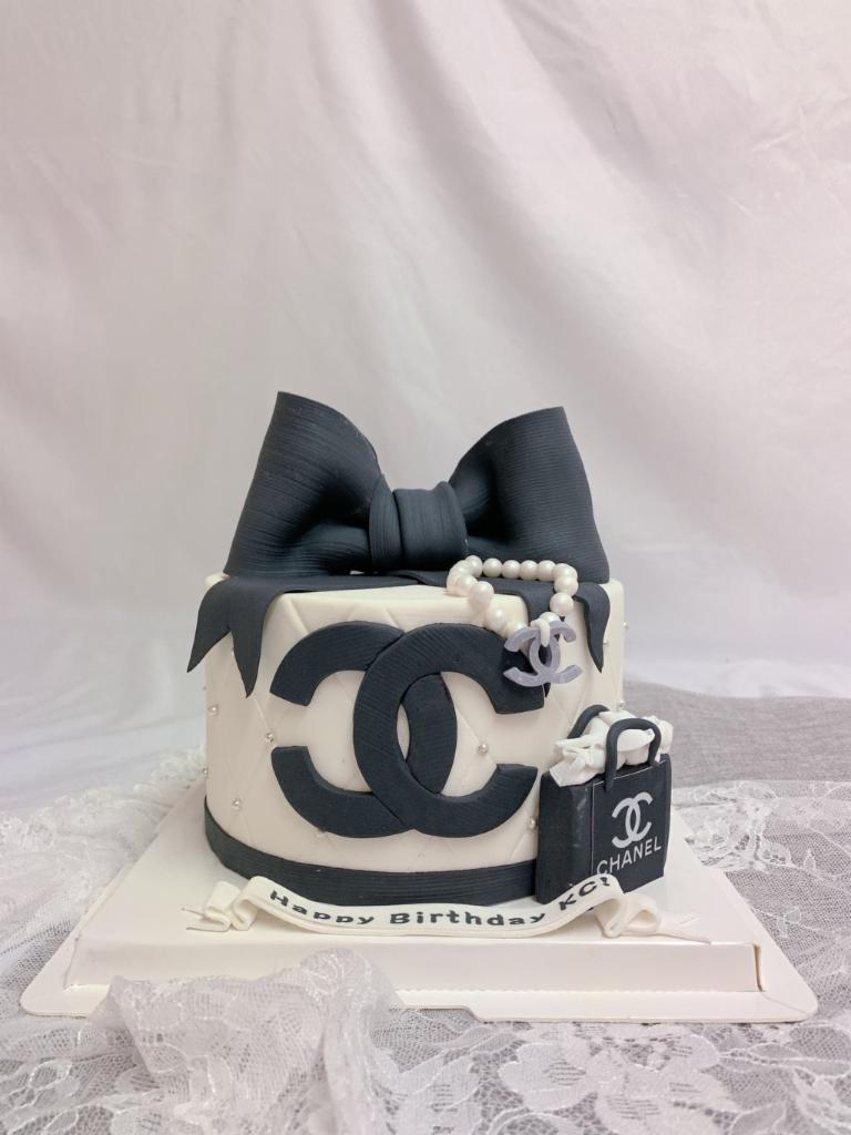 The Chanel Cake · Fondant hand made cake, all edible- please pre-order 1-2 days in advanced.
