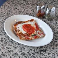 Traditional Grandma Slice · Fresh mozzarella with San Marzano tomato.