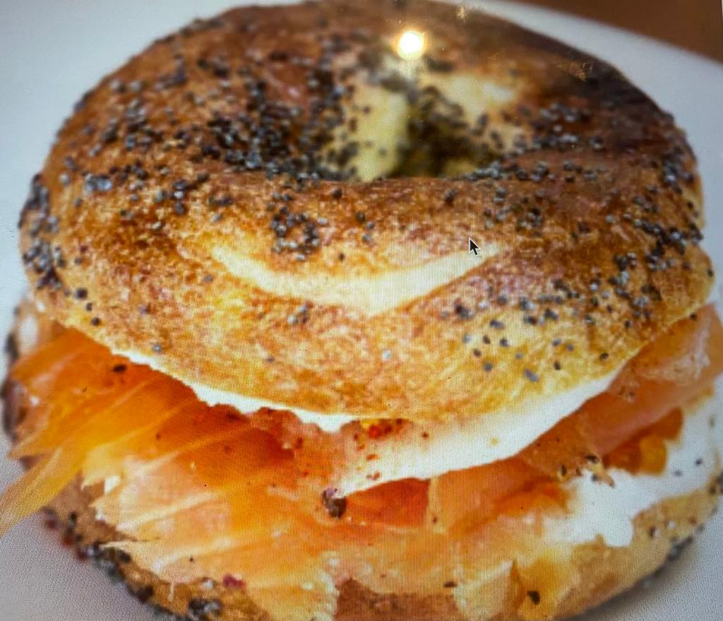 The Ultimate Smoked Salmon Bagel  · Lox, cream cheese, lettuce, tomato, red onion and capers.