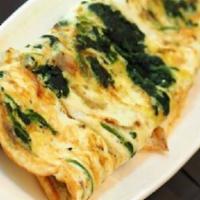 Florentine Omelette  · Freshly prepared, 2 farm fresh eggs, spinach, feta cheese.