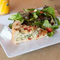 Quiche · Spinach, red pepper, fontina cheese and side salad with champagne dressing.