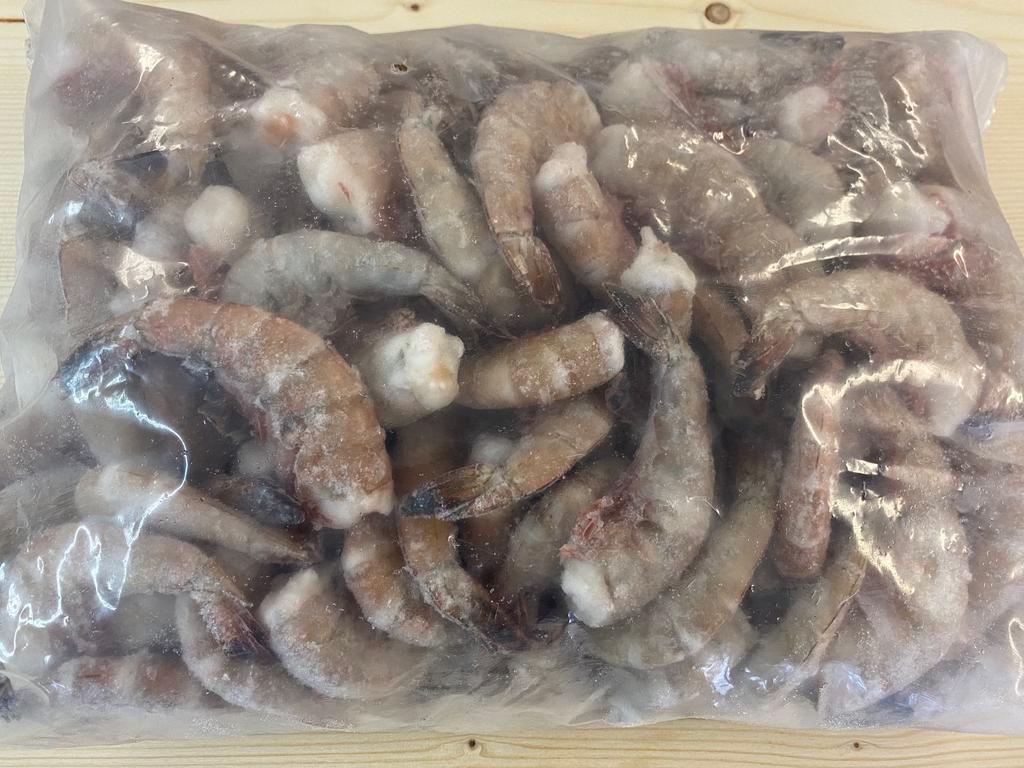 Gulf Shrimp · Wild caught, flash frozen, headless, size = 26x30.  Sold in 2lb or 5lb bags.