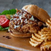 BBQ Fried Chicken Sandwich · Fried chicken, coleslaw, and a side of Bruce's BBQ sauce.