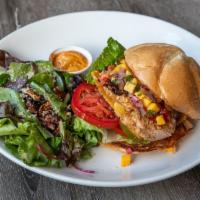 Mango Cheddar Grilled Chicken Sandwich · Grilled chicken with crispy cheddar and mango salsa. Chipotle aioli on the side.