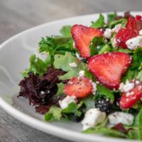 Fresh Berry Salad · Fresh berries, house poppy seed dressing, feta, and mixed greens.