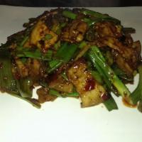 53. Spicy Double Cooked Pork · Sliced belly pork and scallion sauteed in Szechuan style spicy brown sauce.