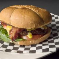 Burger · It has a beef patty, cheese, bacon, lettuce, tomato, and optional ingredients like pickles, ...