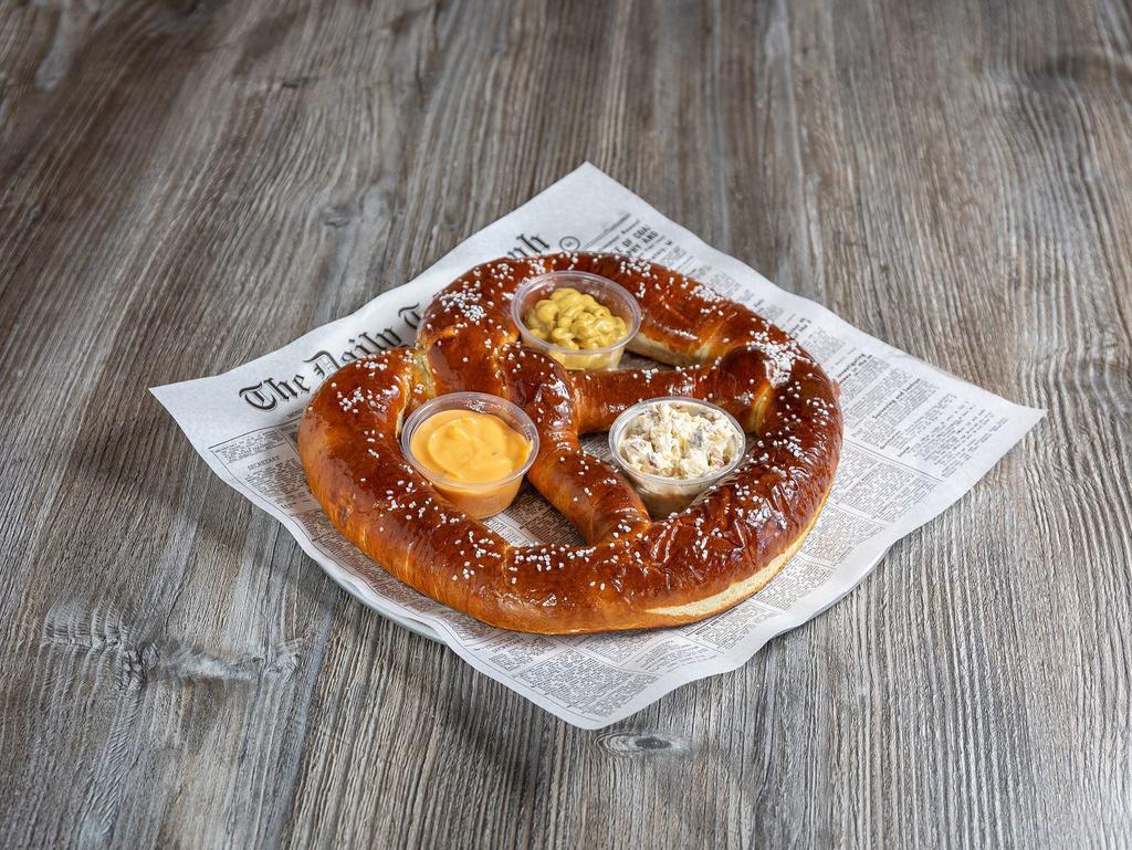 Giant Soft Pretzel · Served with bacon ranch dip, beer cheese dip and gourmet mustard.