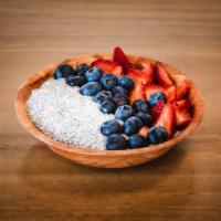 Chia Pudding · Chia seeds soaked in unsweetened coconut milk, vanilla and agave. Topped with seasonal fruit