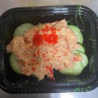 Lobster Salad · Mixture of lobster meat, mayonnaise, wasabi tobiko and served with cold cucumber. 