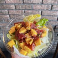 Tuna and Mango Salad · Red tuna mix with mango garden green and served with mild spicy citrus and soy. 