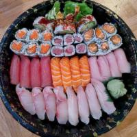 Sushi Roll Party Tray · Choose any 4 regular rolls, with 20 pieces of sushi. Sushi includes salmon, tuna, yellowtail...