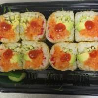 Rich Roll · Spicy salmon, crunch, cucumber, avocado, wrapped with marble seaweed and dressed with hot sa...