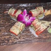 Volcano Roll · Shrimp tempura, cucumber with spicy tuna and marble seaweed on top. 