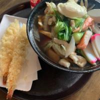 Nabeyaki Udon · Noodle soup with crabmeat stick, egg, chicken, vegetable and shrimp tempura.