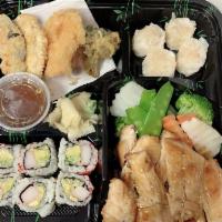 Bento Box · California roll, shrimp shumai, vegetable tempura, your choice of entree, and choice of rice.