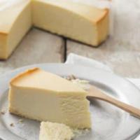 New York Cheesecake · Traditional New York cheesecake flavored with a hint of vanilla, on a sponge cake base.