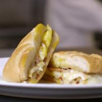 1. Two Eggs on a Roll  · Sandwich served on a soft bread roll.