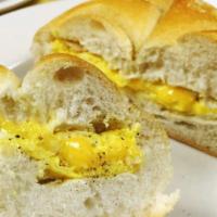 2. Two Egg with Cheese on a Roll  · Sandwich served on a soft bread roll.