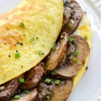  4. Mushrooms and Swiss Cheese Platter · 3 eggs, sauteed mushrooms and Swiss cheese.