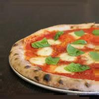 14” Classic Margherita Pizza · Signature marinara, extra virgin olive oil, fresh mozzarella, fresh basil, and oregano.