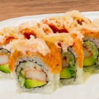 Volcano Roll · Spicy tuna on top of California roll with spicy mayo, scallion and crunchy flakes on top.