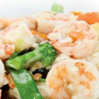 S12. Tung Ting Shrimp · Jumbo shrimp marinated with broccoli, mushroom and bamboo shoots in white sauce.