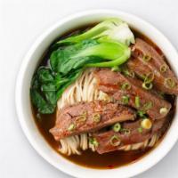 Braised Beef Noodle Soup 紅燒牛肉麵 · Braised beef served with noodles and bok choy in a slow-cooked deep flavor broth