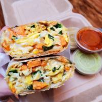 Veggie Burrito · Cinnamon sweet potato, eggs, red bell pepper, onion, feta.

