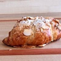 Almond Croissant  · A flaky French pastry.