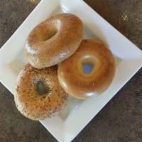 Artisan Bagel - Toasted  · Choose between Plain, Everything or Wheat Bagels, 
Bagels are sliced and toasted unless othe...