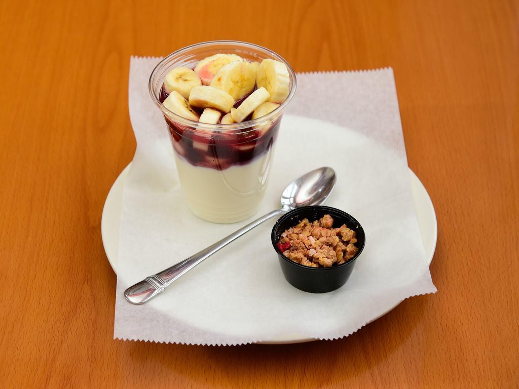 Yogurt Parfait · Vanilla yogurt served with banana and granola, infused with your choice of strawberry, wildberry, mango or peach.