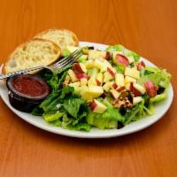 Cranberry Apple Walnut Salad · Chopped romaine, Asiago cheese, walnuts, dried cranberries and crisp chopped apple.